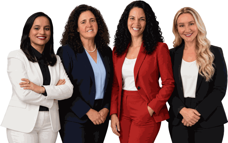 Delgado Purdy Law's four immigration attorneys standing together: Luz Pedraza, Jacqueline Delgado, Thais Arsolino Purdy and Jessica Smith